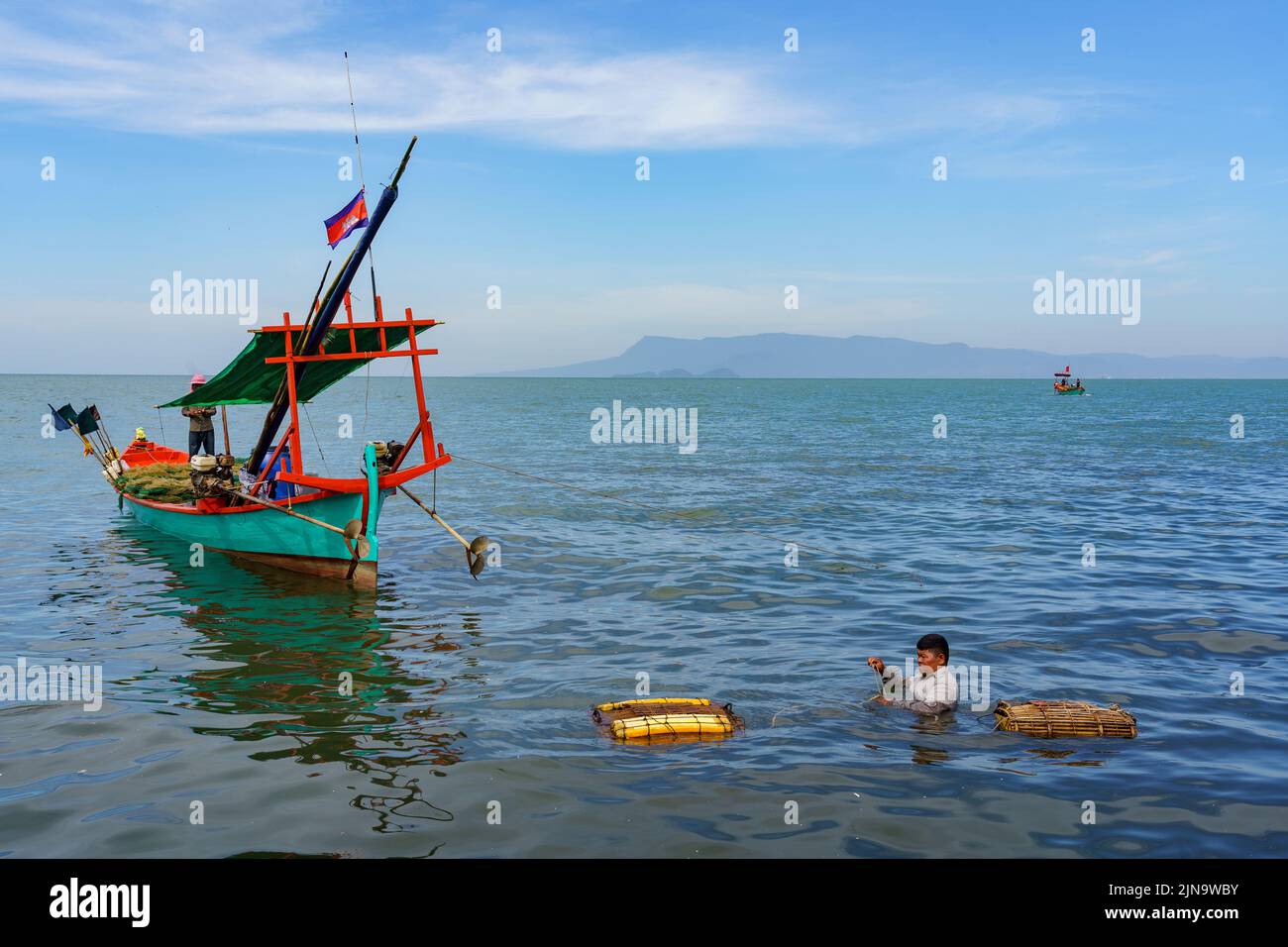 Cambodia. The seaside resort of Kep. Krong Kep Province. Crab market. Crabs are kept in submerged baskets to keep them fresh Stock Photo