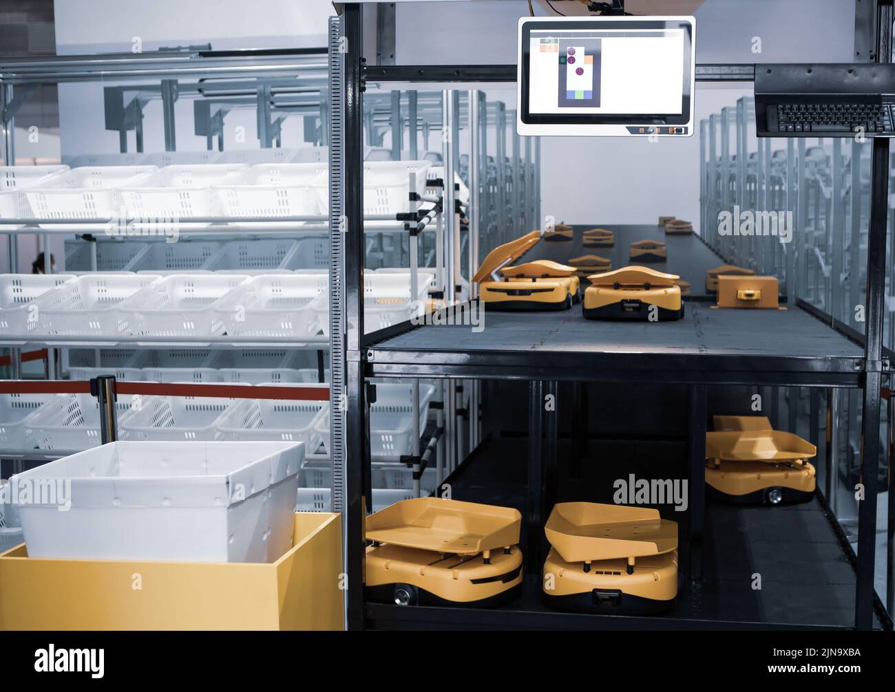 3D vertical Sorting robot system in modern warehouse Stock Photo - Alamy