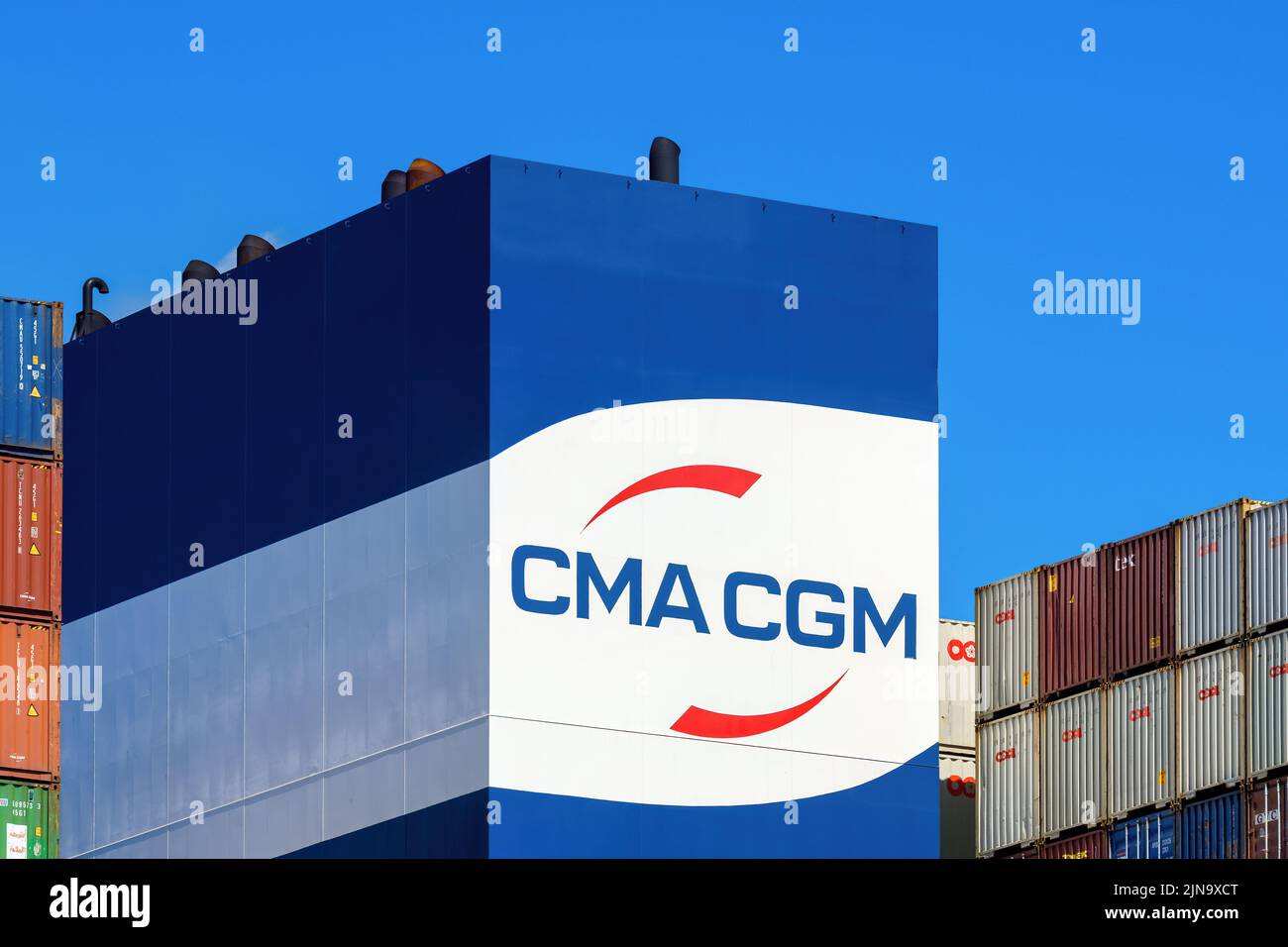 The CMA CGM logo on the funnel of the container carrier CM CGM Mexico