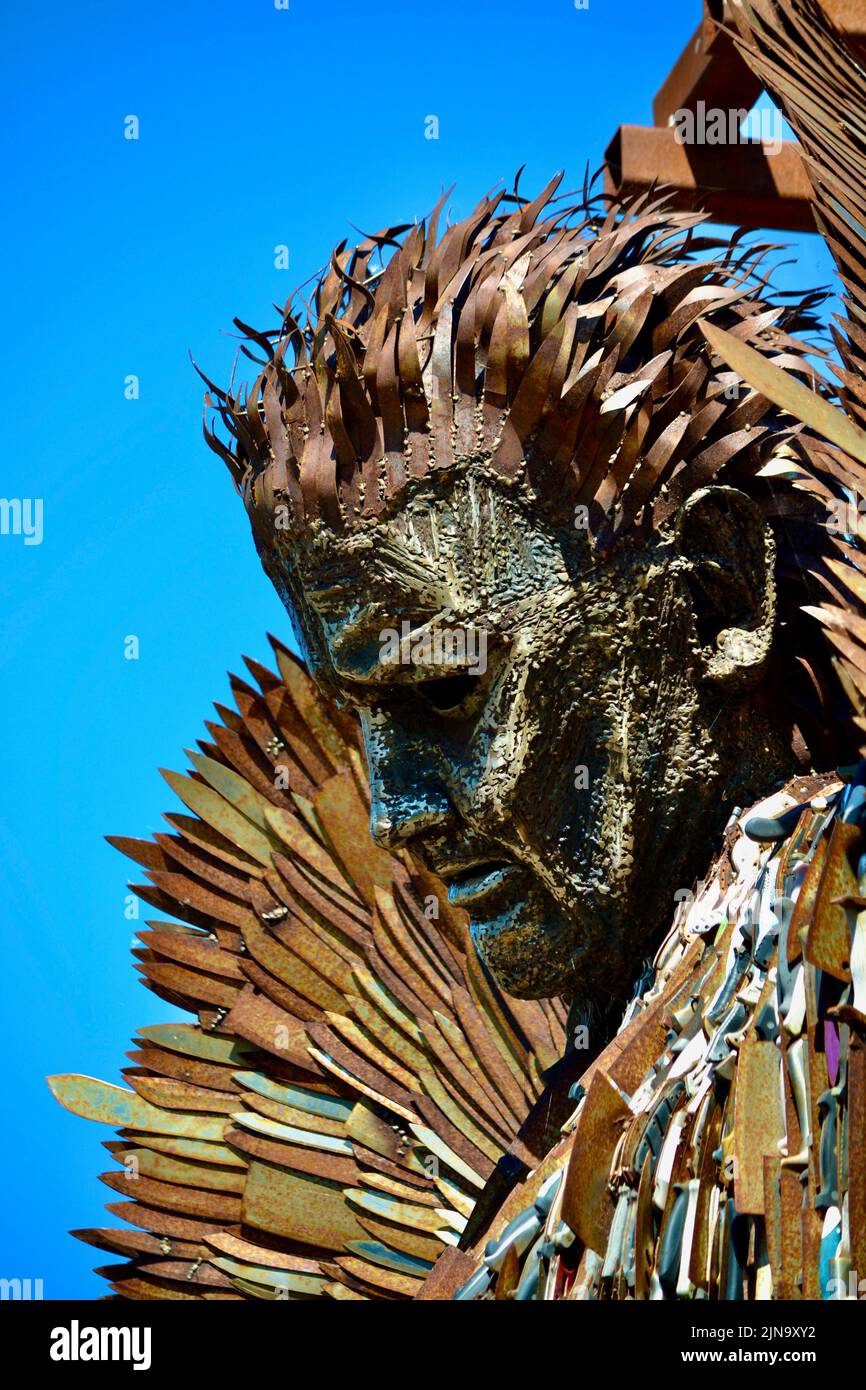 Redcar, UK. 10 Aug 2022. The thought provoking ‘Knife Angel’, comprised of 100,000 weapons removed from the streets of Britain, sculpted by Alfie Bradley is on display at Kirkleatham Museum, Redcar during August. The Angel was designed with the support of all 43 UK Police Forces to create social change through raising awareness of how violence & aggressive behaviour impacts our communities through education and working with young people to renounce violence as a way of solving problems.  It also acts as a memorial for those lives lost. Credit:  Teesside Snapper/Alamy Live News Stock Photo