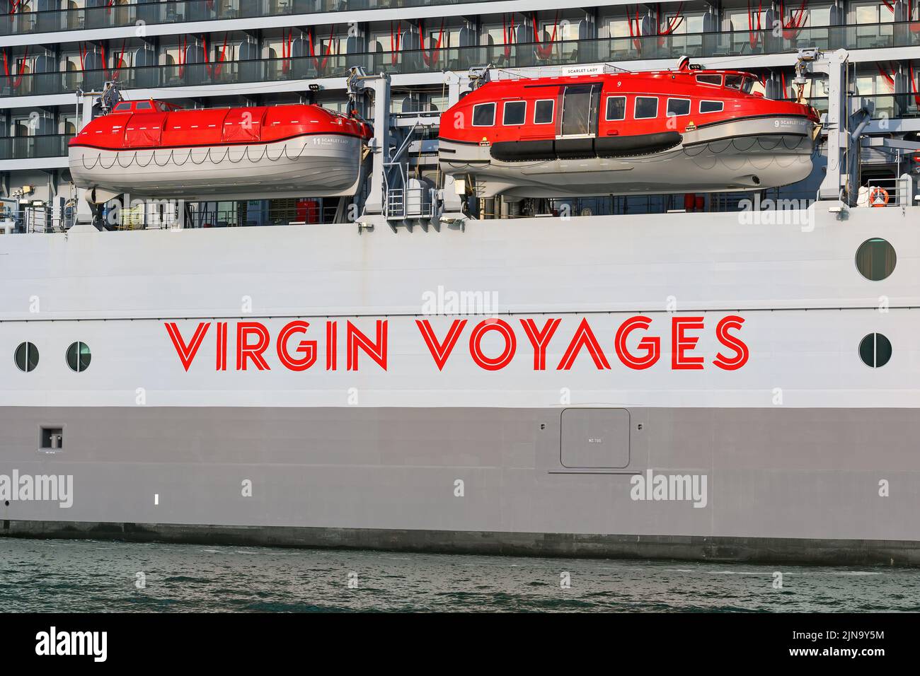 The Virgin Voyages logo on the cruise ship Scarlet Lady - June 2021. Stock Photo