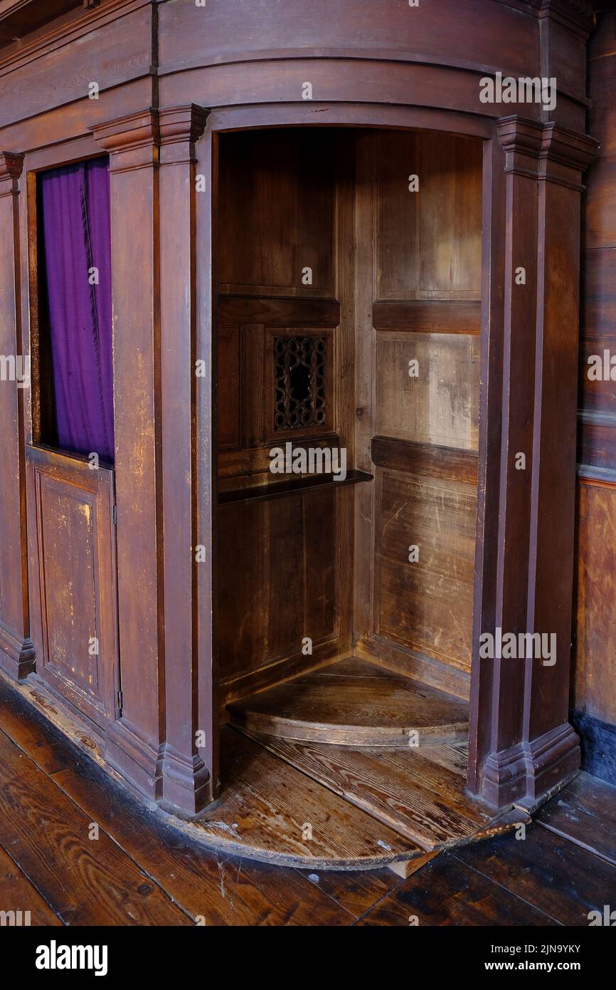 Old Idaho Cataldo Mission Church Building Structure in Northern Idaho Interior Chapel Confessional wooden carved Stock Photo
