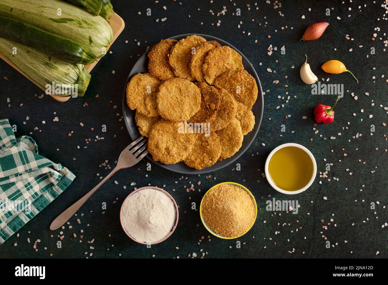 Homemade zucchini chips cooked with gluten free bread crumb, rice flour