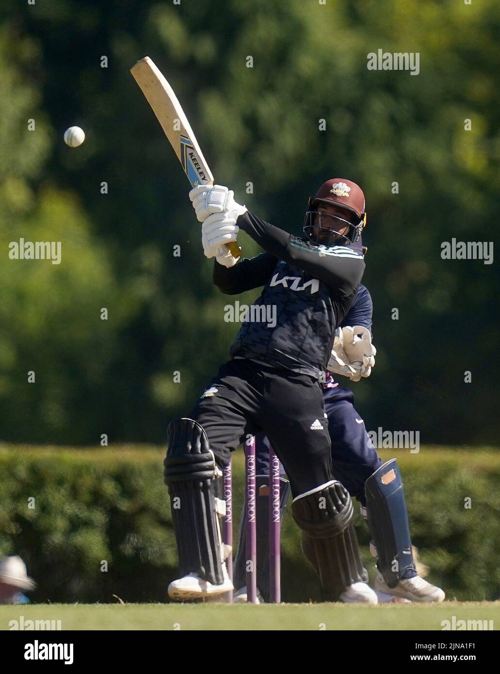 Surrey's Ryan Patel hits a boundary during Royal London One-Day Cup Group A match at Radlett Cricket Club, Hertfordshire. Picture date: Wednesday August 10, 2022. Stock Photo