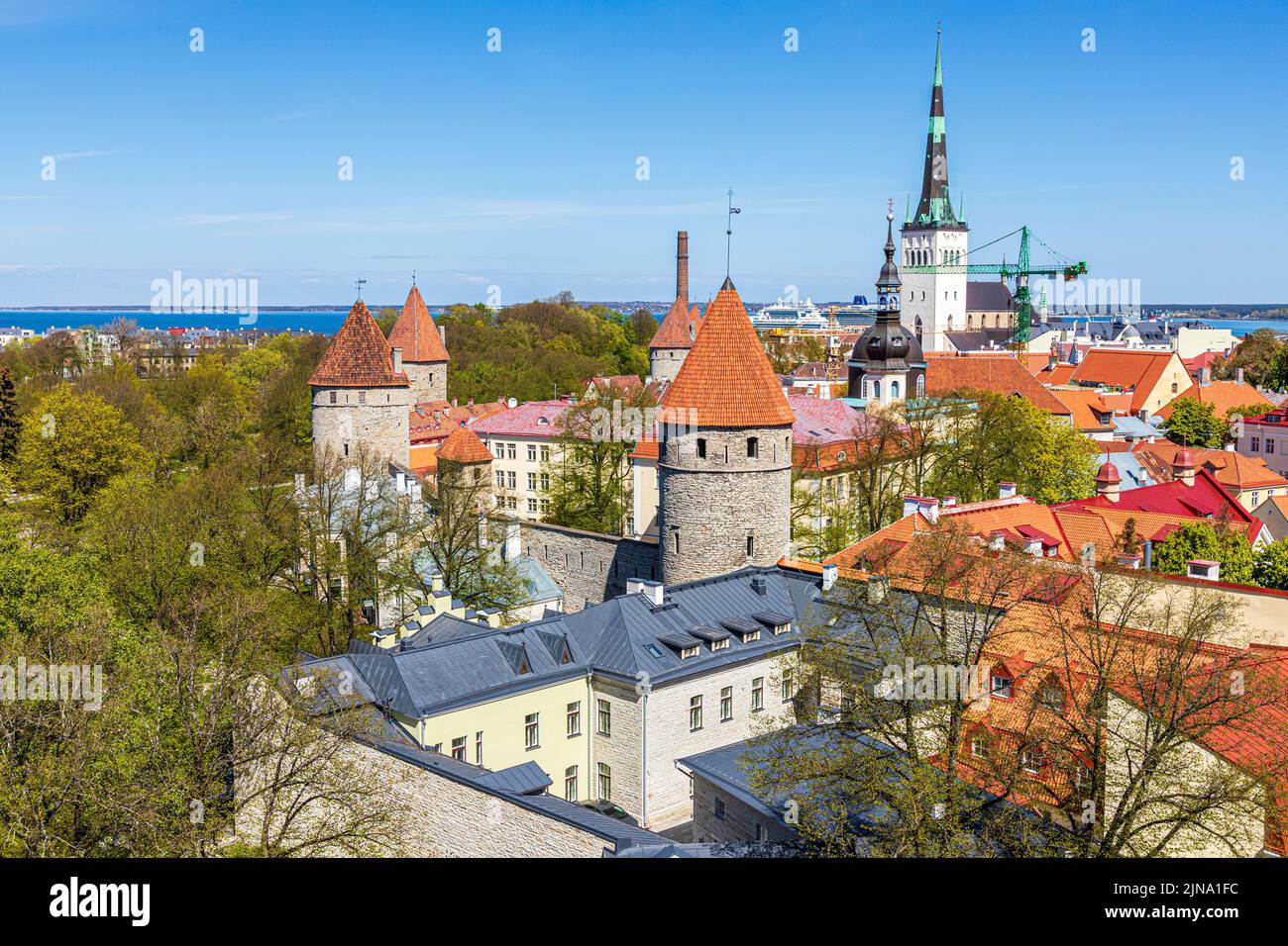 Looking out from the Upper Town over the rooves of the old town of Tallinn the capital city of Estonia Stock Photo