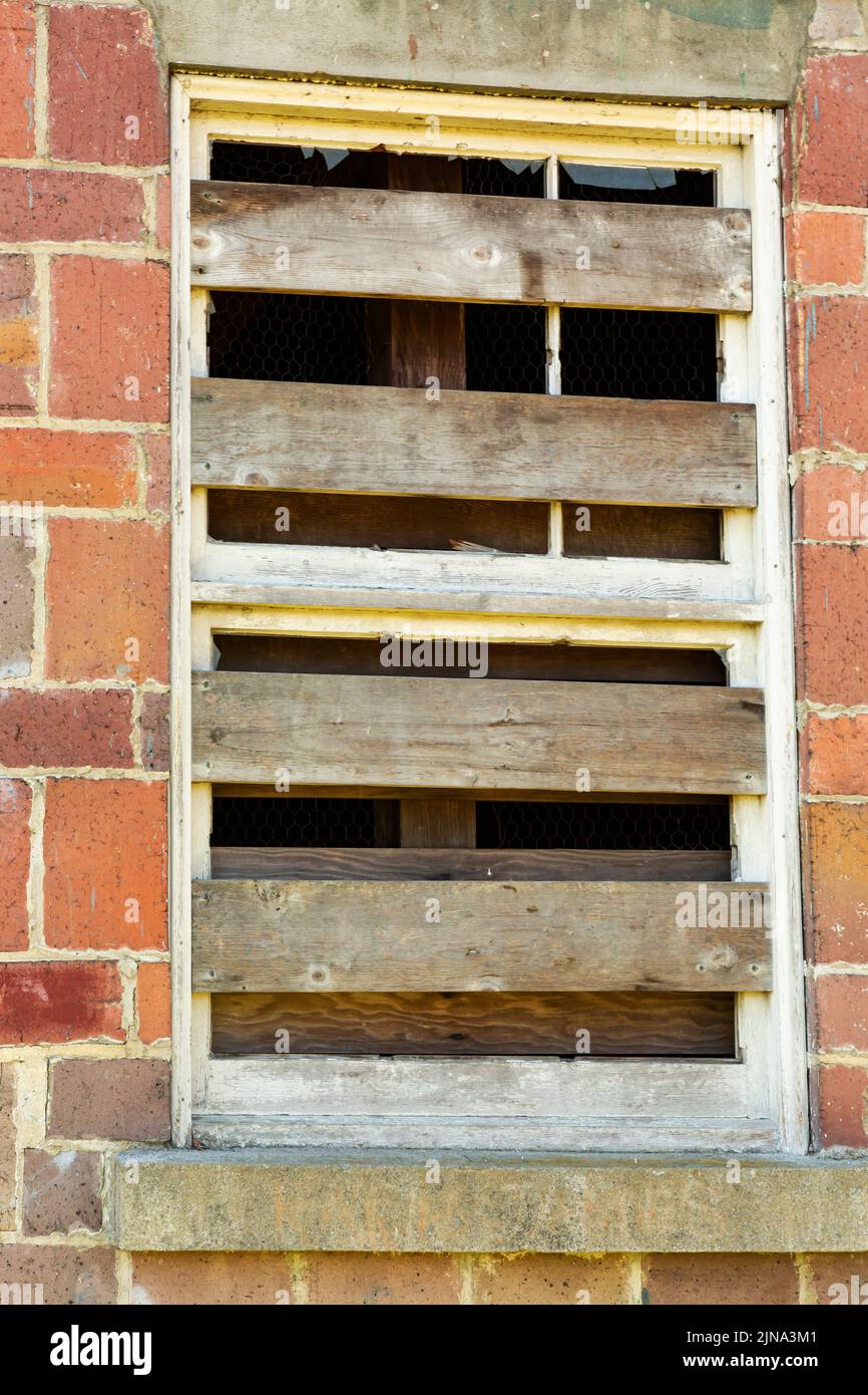 WA21882-00...WASHINGTON - A boarded over window in an old building at Fort Steilacoom Park. Stock Photo