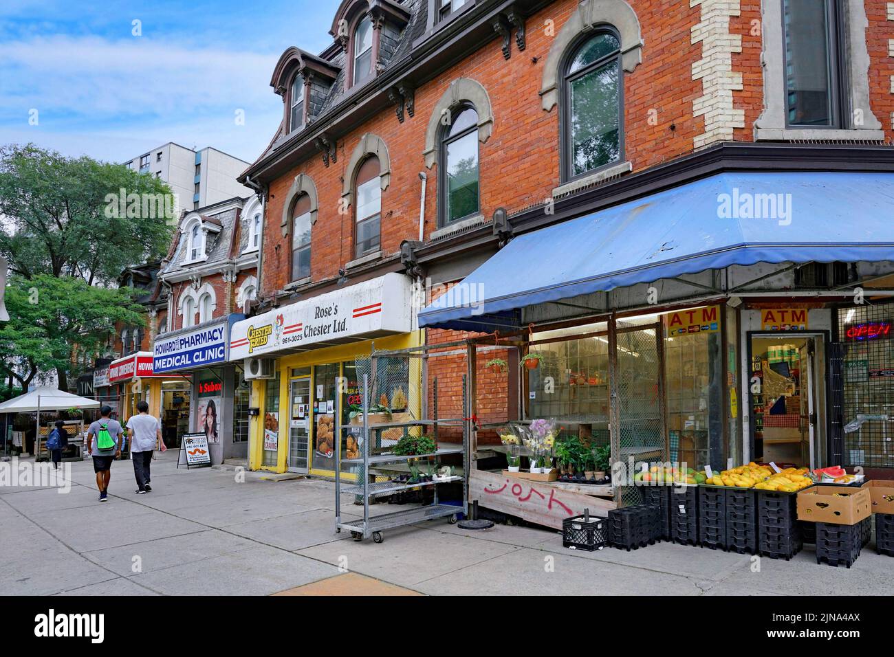 Toronto, Ontario, Canada - A row of stores and restaurants in the old Cabbagetown neighborhood with heritage architecture, preserved 19th century buil Stock Photo