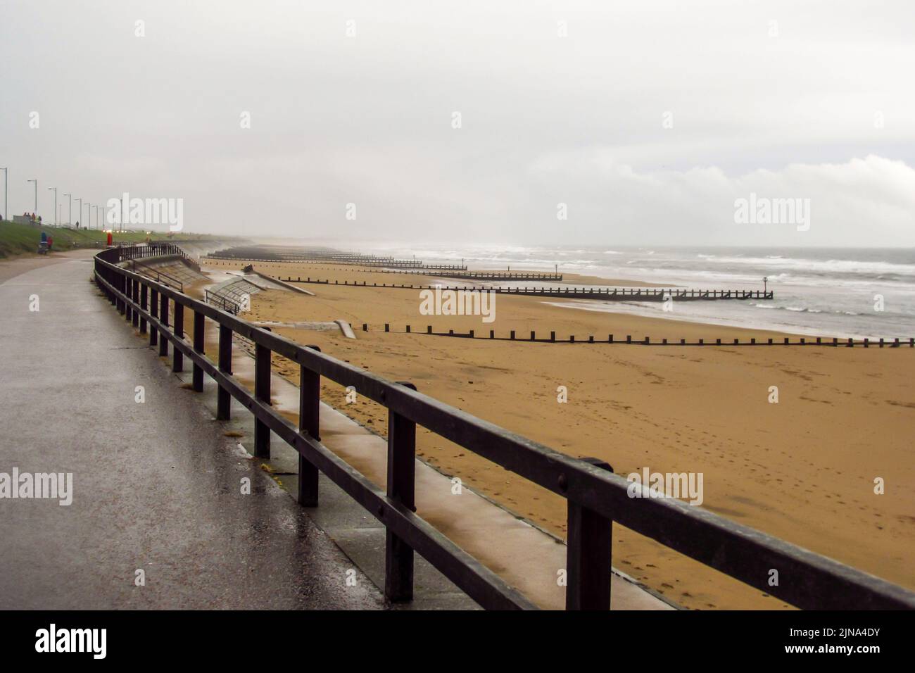 The deserted esplanade next to the Aberdeen Beach, Scotland, on a cold, wet rainy day. Stock Photo