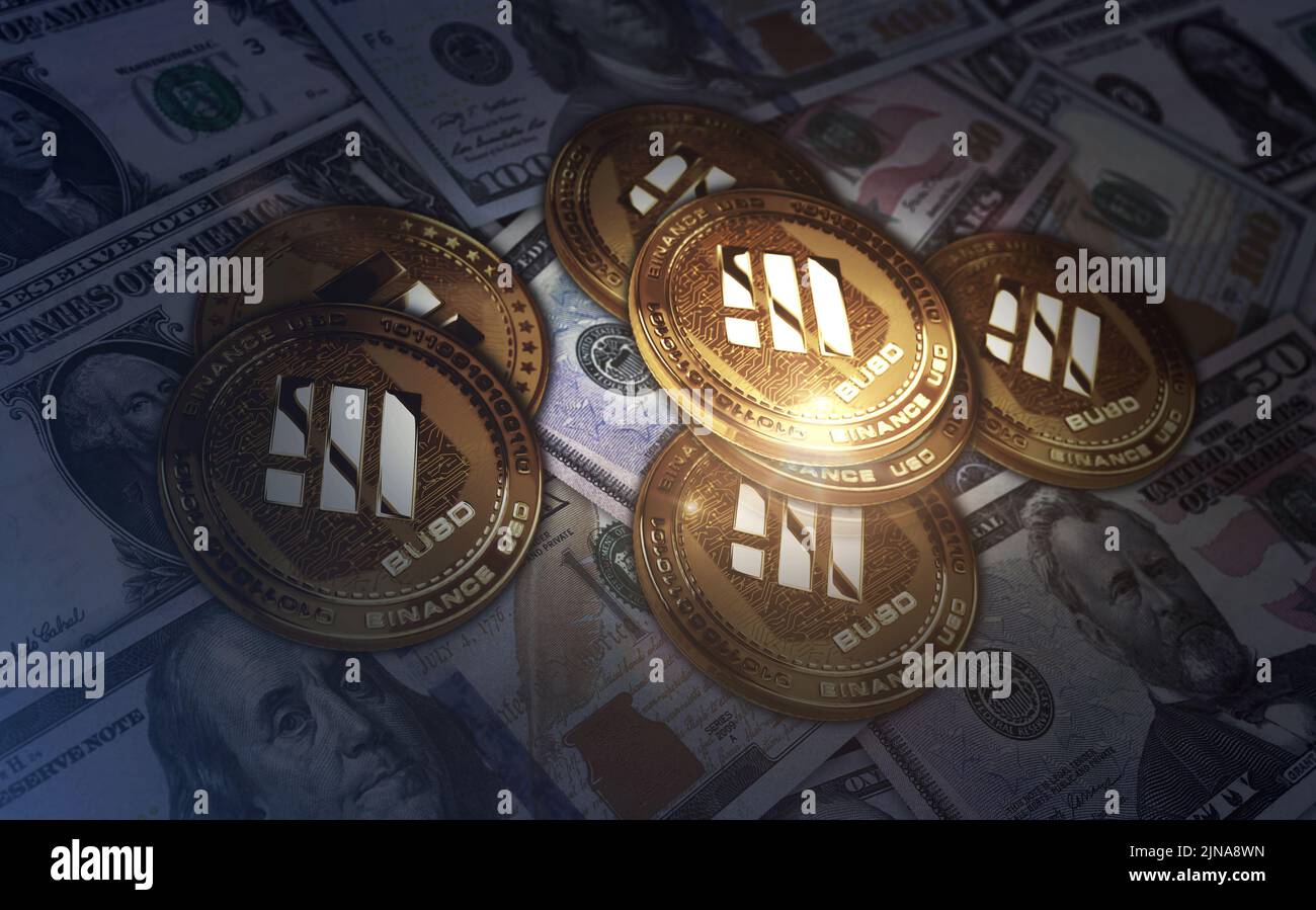 Binance BUSD stablecoin cryptocurrency golden coin over Dollar banknotes. Online payment and crypto money transaction abstract concept 3d illustration Stock Photo
