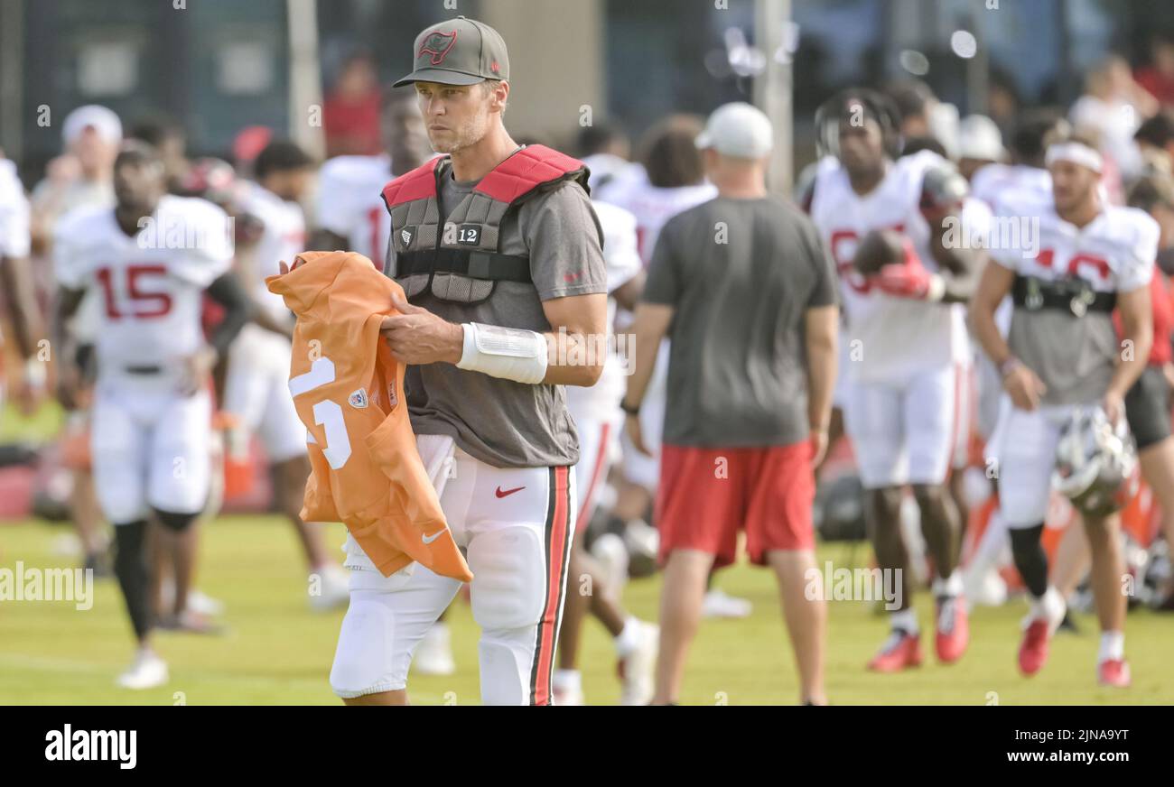 Tampa, United States. 10th Aug, 2022. Tampa Bay Buccaneers quarterback Tom Brady (12) walks with his jersey before a joint practice with the Miami Dolphins at the Buccaneer's training center in Tampa, Florida on Friday, August 10, 2022. Photo by Steve Nesius/UPI Credit: UPI/Alamy Live News Stock Photo