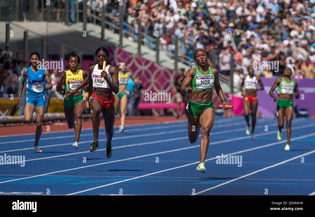 Daryll Neita of England and Nzubechi Grace Nwokocha of Nigeria competing in the women’s 4x100m relay final at the Commonwealth Games at Alexander Stad Stock Photo
