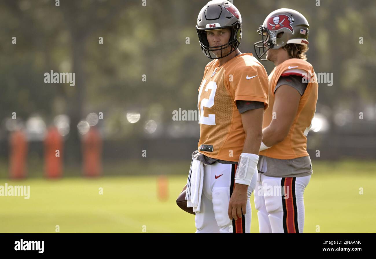Tampa, United States. 10th Aug, 2022. Tampa Bay Buccaneers quarterback Tom Brady (12) loosens up during a joint practice with the Miami Dolphins at the Buccaneer's training center in Tampa, Florida on Wednesday, August 10, 2022. Photo by Steve Nesius/UPI Credit: UPI/Alamy Live News Stock Photo