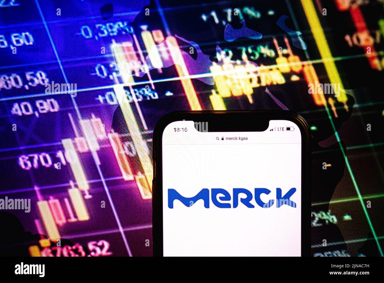 KONSKIE, POLAND - August 09, 2022: Smartphone displaying logo of Merck KGaA company on stock exchange diagram background Stock Photo