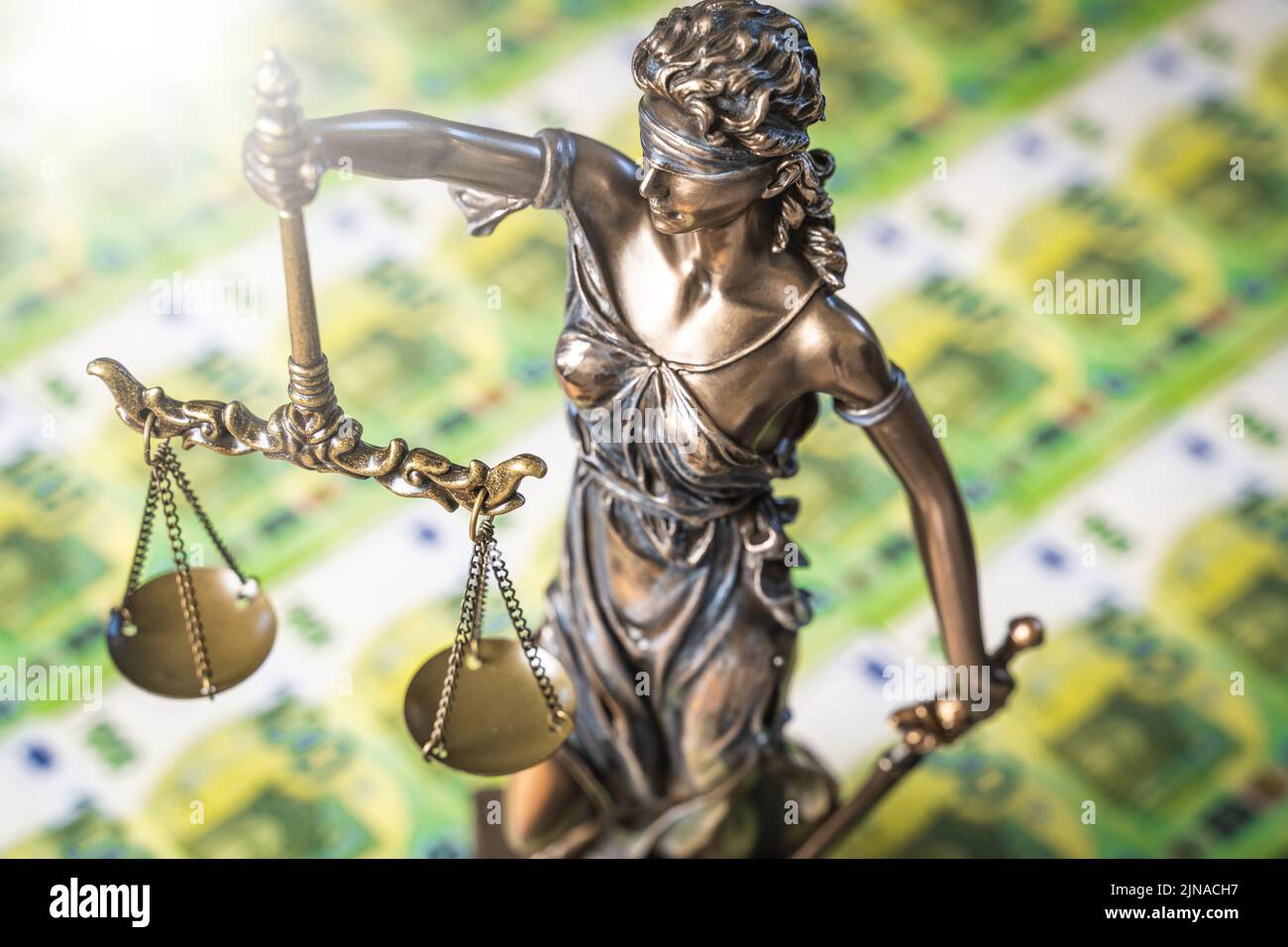 20 April 2022: Lady Justice Statue On 100 Euro Money Bills. Hundred Euro Bill. Symbol Image Costs For Court And Lawyer Stock Photo