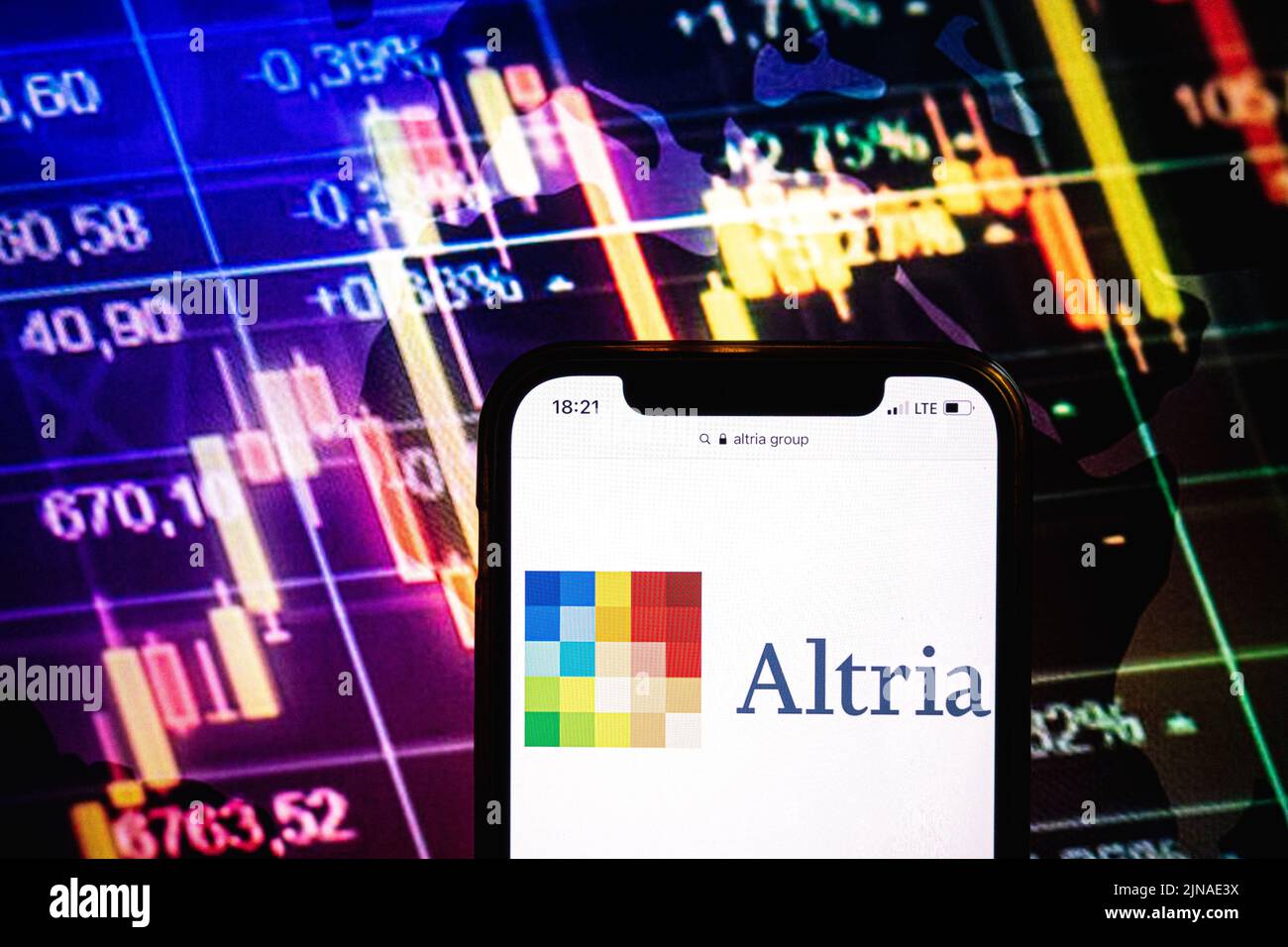 KONSKIE, POLAND - August 09, 2022: Smartphone displaying logo of Altria Group company on stock exchange diagram background Stock Photo