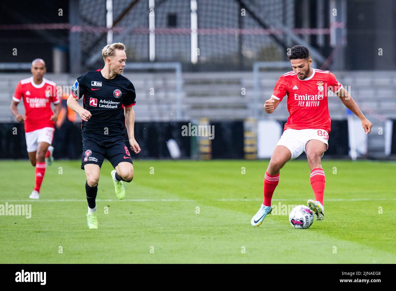 Randers, Denmark. 09th, August 2022. Goncalo Ramos (88) of Benfica and Joel Andersson (6) of FC Midtjylland seen during the UEFA Champions League qualification match between FC Midtjylland and Benfica at Cepheus Park in Randers. (Photo credit: Gonzales Photo - Balazs Popal). Stock Photo