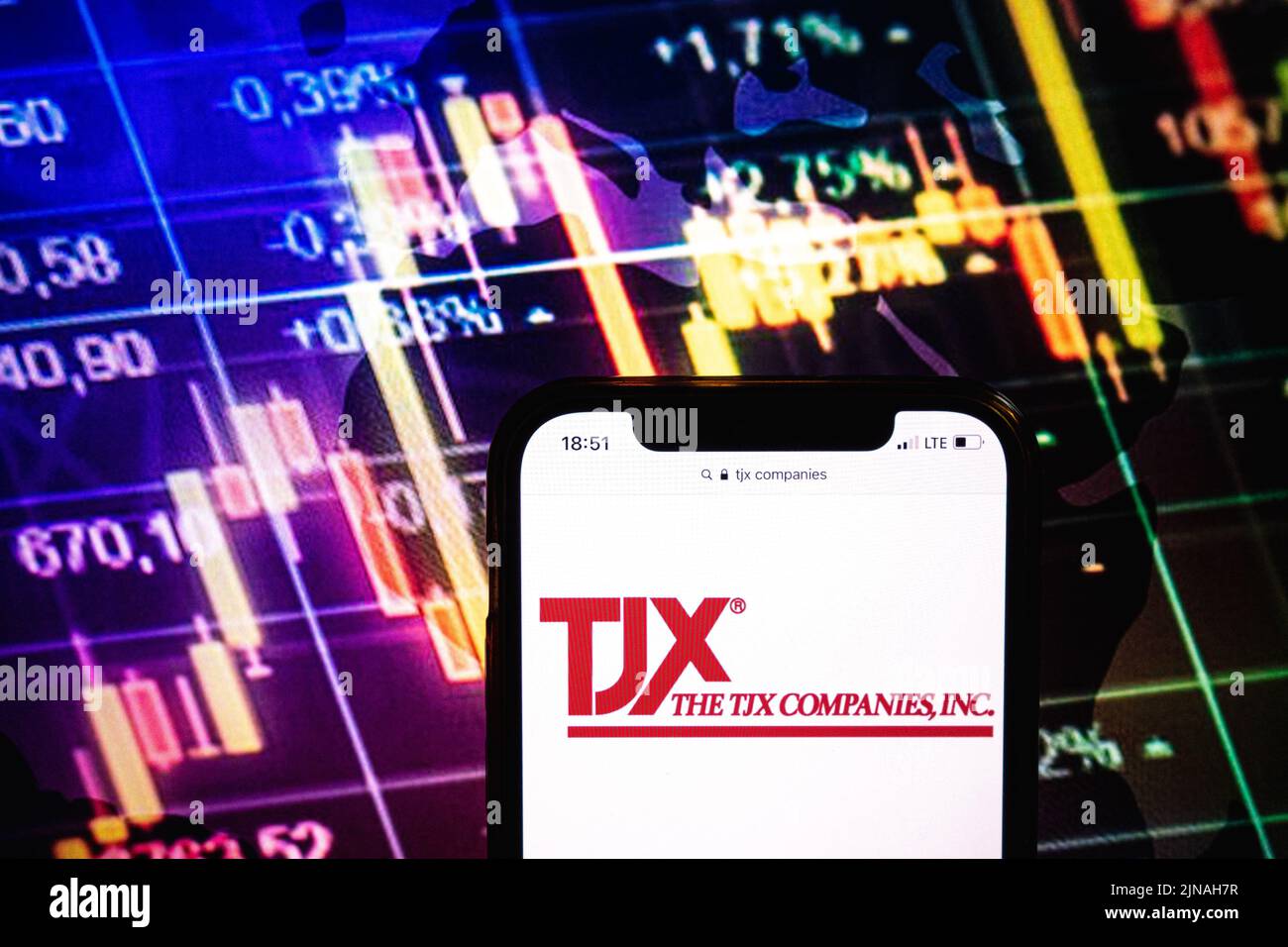 KONSKIE, POLAND - August 09, 2022: Smartphone displaying logo of TJX Companies on stock exchange diagram background Stock Photo