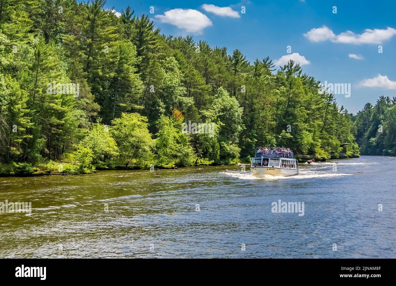 Sightseeing tour boat in the Wisconsin River in the Wisconsin Dells in Wisconsin USA Stock Photo
