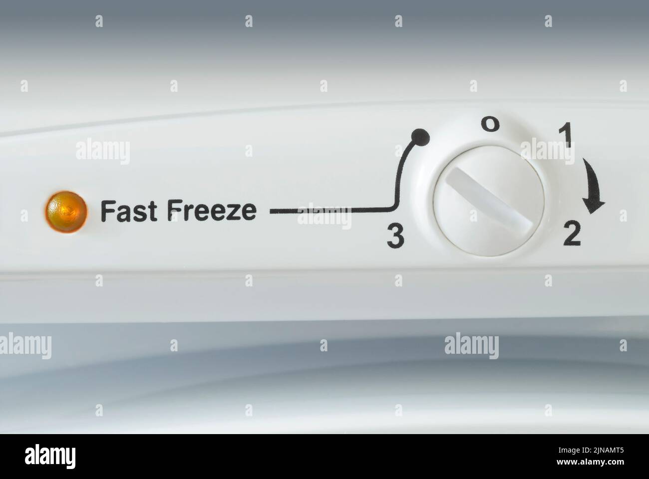 Macro close-up of a temperature control on the front of a domestic freezer Stock Photo