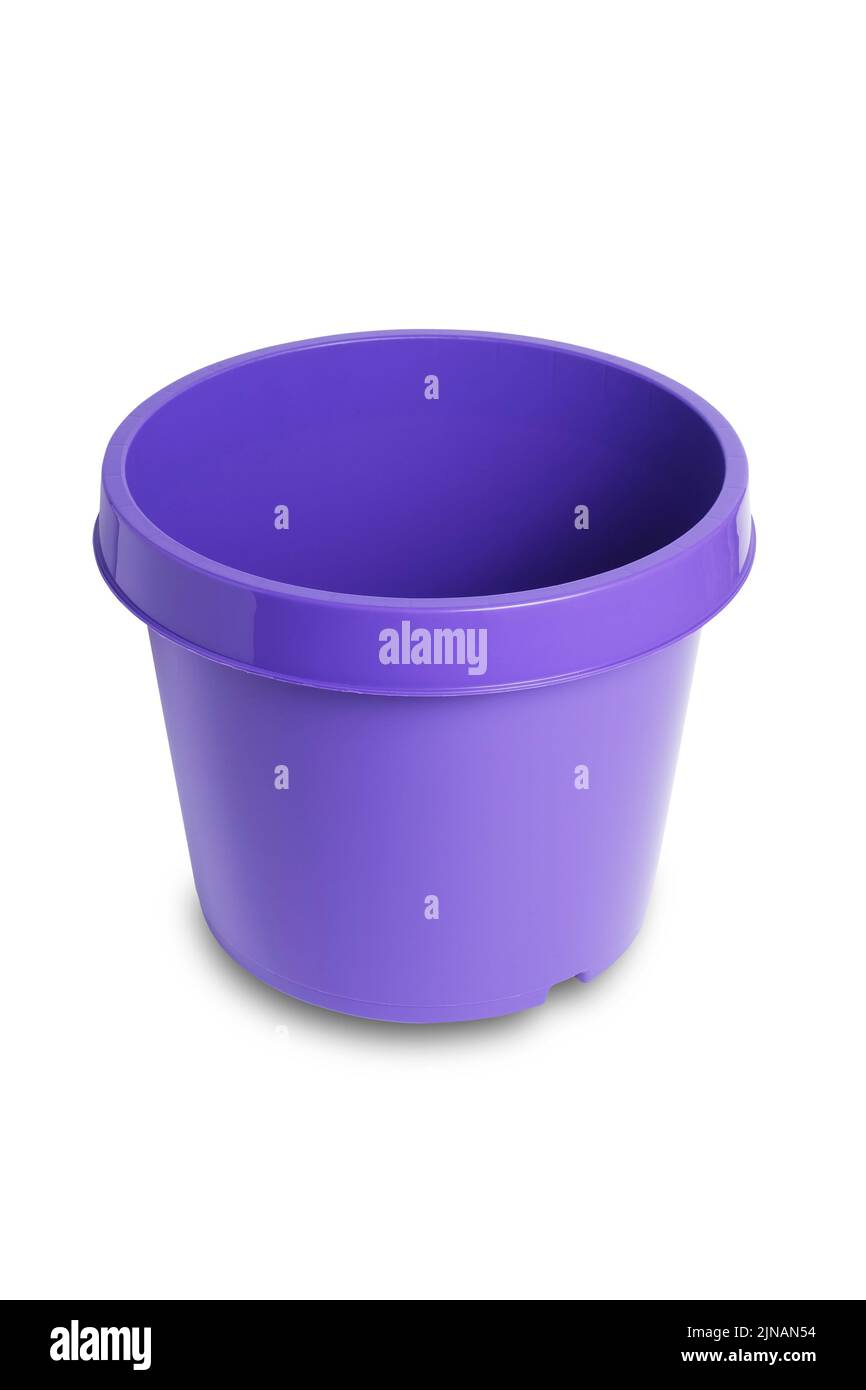 Purple plastic plant pot isolated on white background with clipping path cut out Stock Photo