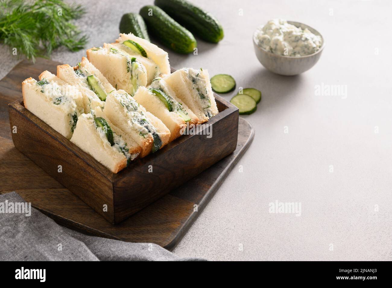 English tea sandwiches with cream cheese, dill, cucumber Stock Photo