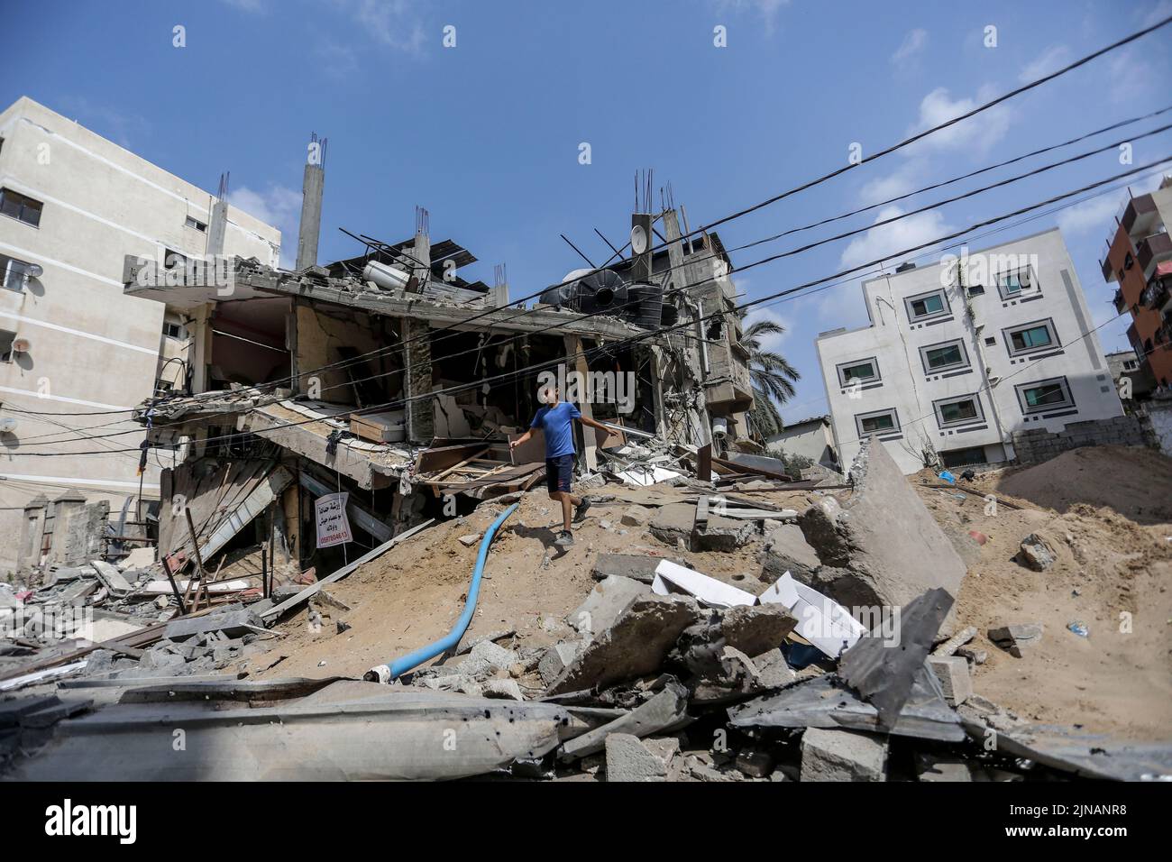 Gaza, Palestine. 10th Aug, 2022. A Palestinian inspects the rubble of his  destroyed house after Israeli attacks on Gaza. On 07 August at 23:30 local  time (20:30 GMT), Israel and Palestinian militants