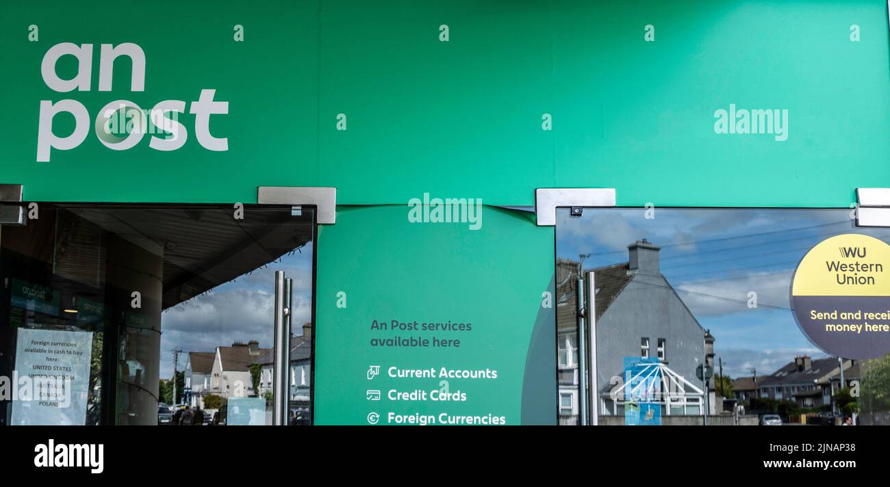 A store sign for An Post, the Irish postal service. Stock Photo