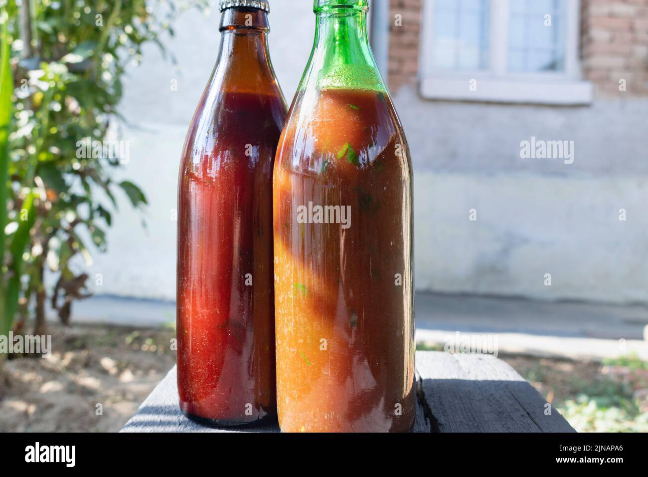 Homemade Tomato sauce in the glass bottle Stock Photo - Alamy
