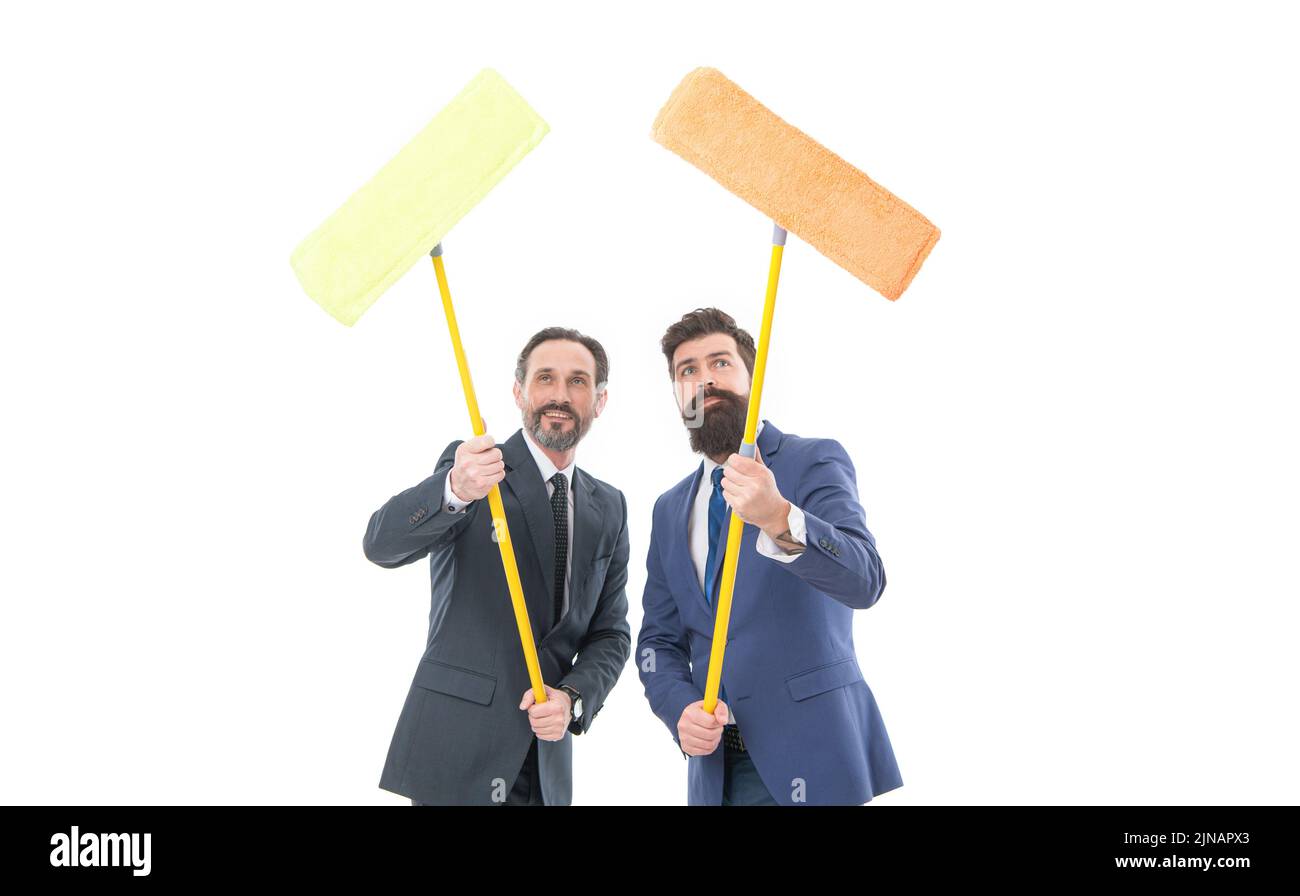 mature bearded men in suit hold householding mop. cleaning company. clean business. clean slate. Partnership and teamwork in clean business Stock Photo
