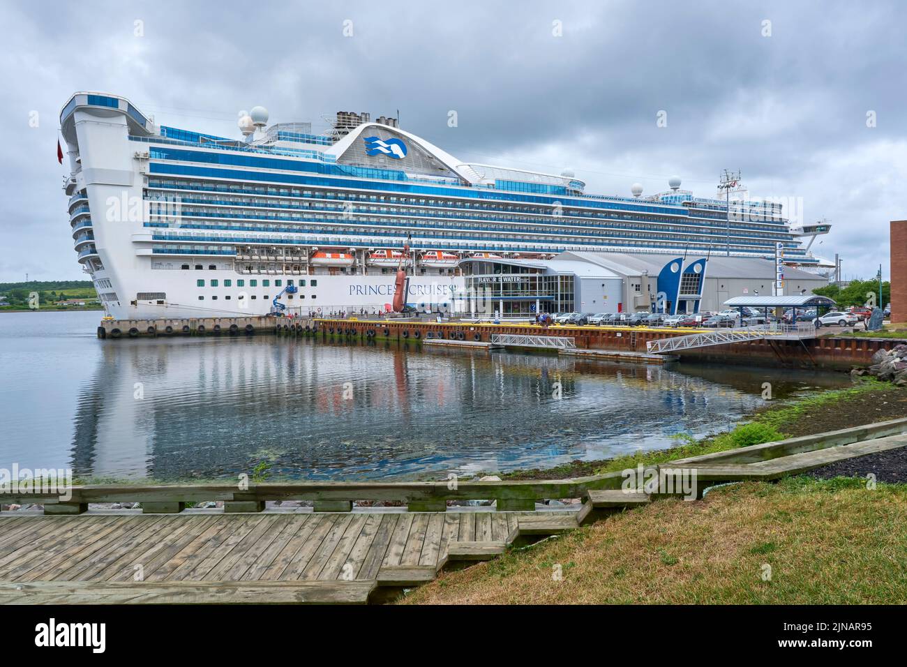 Caribbean Princess during it's Port of Call in Sydney Nova Scotia on August 10, 2022.  The ship is owned by Princess Cruises and has a capacity of ove Stock Photo