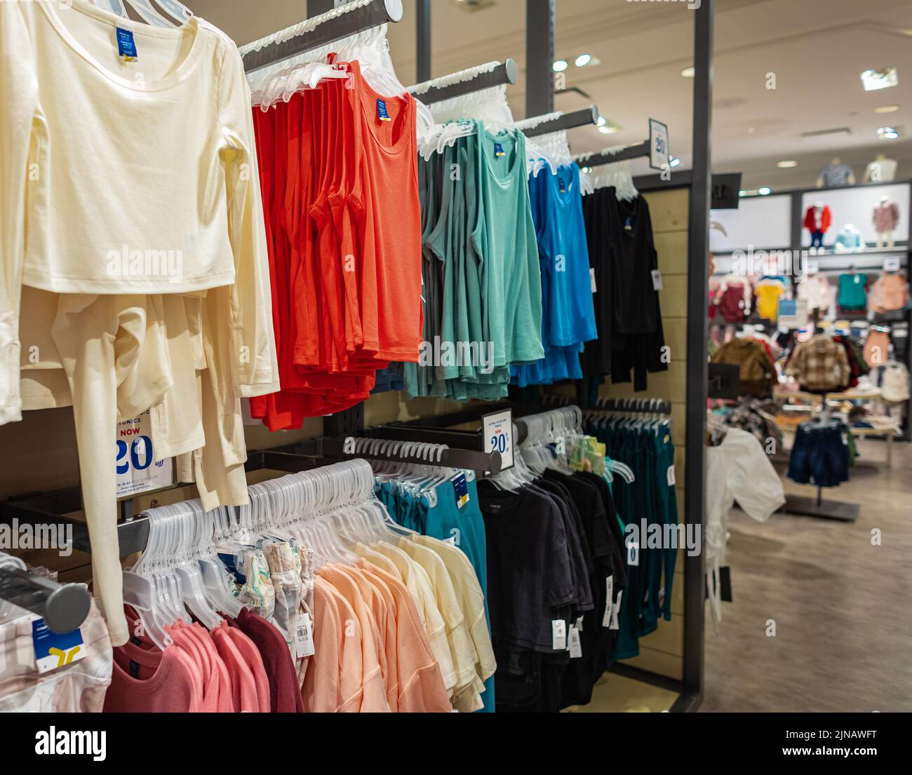 Modern fashionable brand interior of clothing store inside shopping