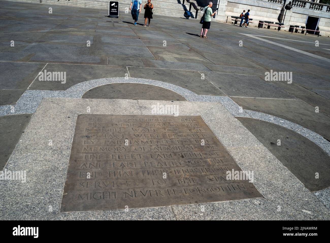 Memorial inscription set in the floor of Trafalgar Square to honour the fountain memorials to Lord Jellicoe and Lord Beatty. Admirals of the fleet Stock Photo