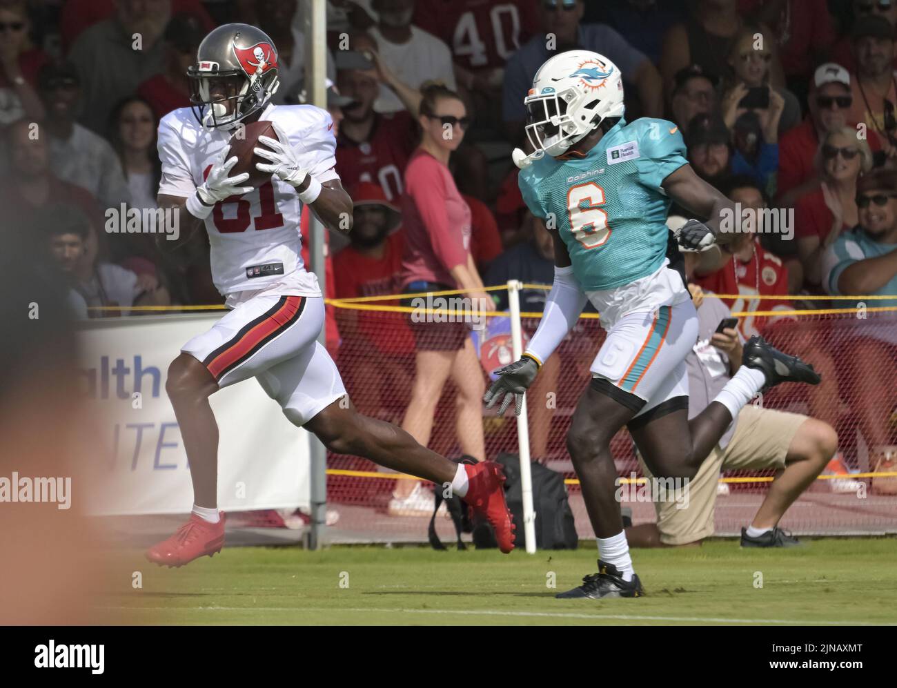 Tampa, United States. 10th Aug, 2022. Tampa Bay Buccaneers' Vyncint Smith (L) beats Miami Dolphins' Trill Williams (6) for a reception during a joint practice at the Buccaneer's training center in Tampa, Florida on Wednesday, August 10, 2022. Photo by Steve Nesius/UPI Credit: UPI/Alamy Live News Stock Photo