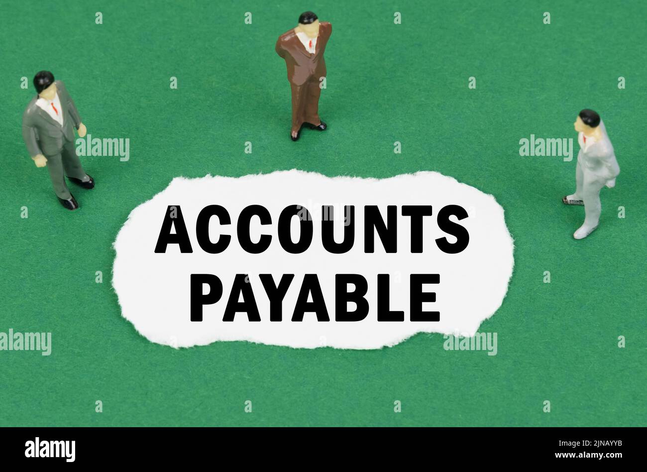 Business and finance concept. On the green surface there are figures of