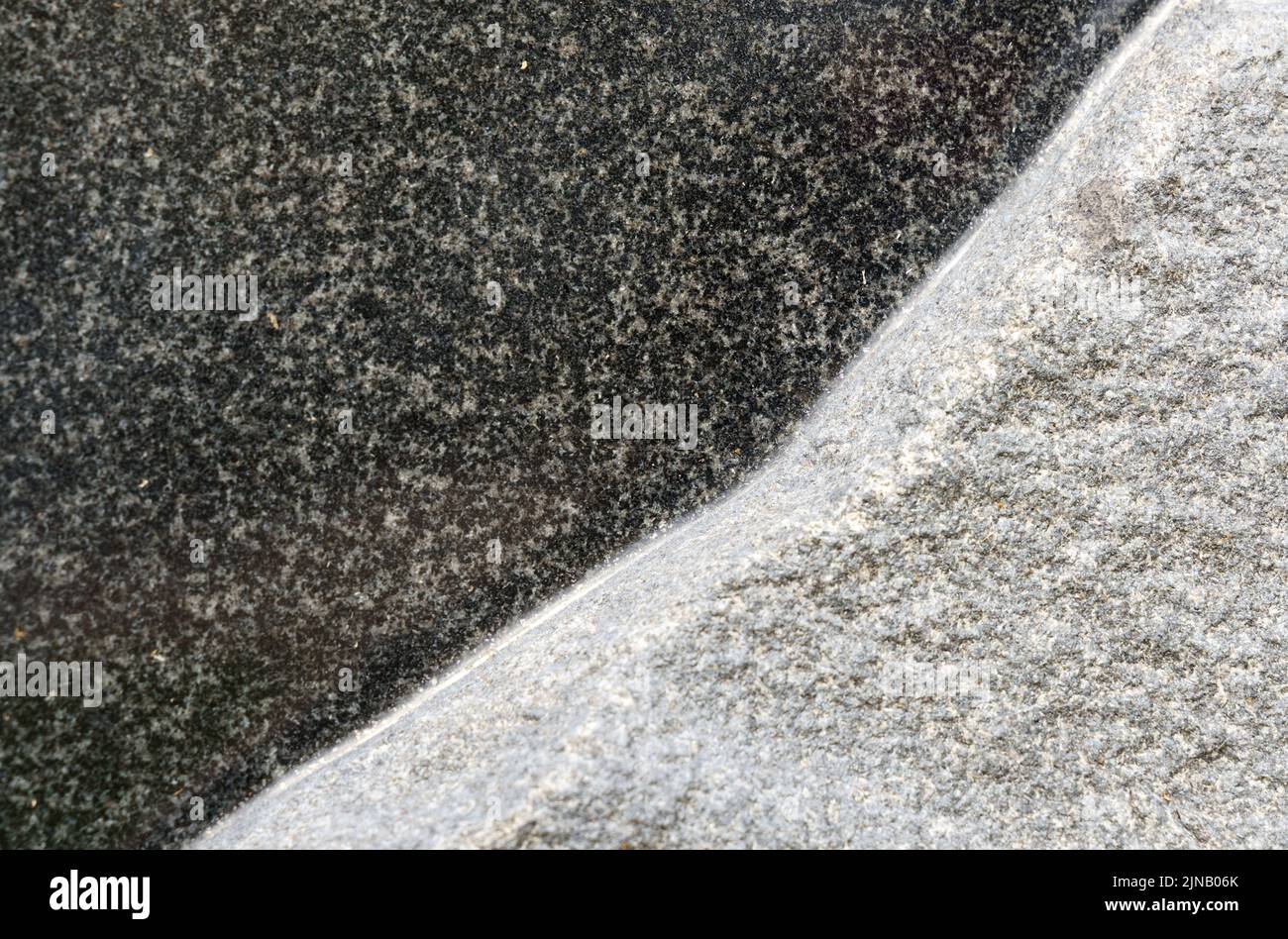 Texture of black and white granite. Closeup. Backgrounds and textures