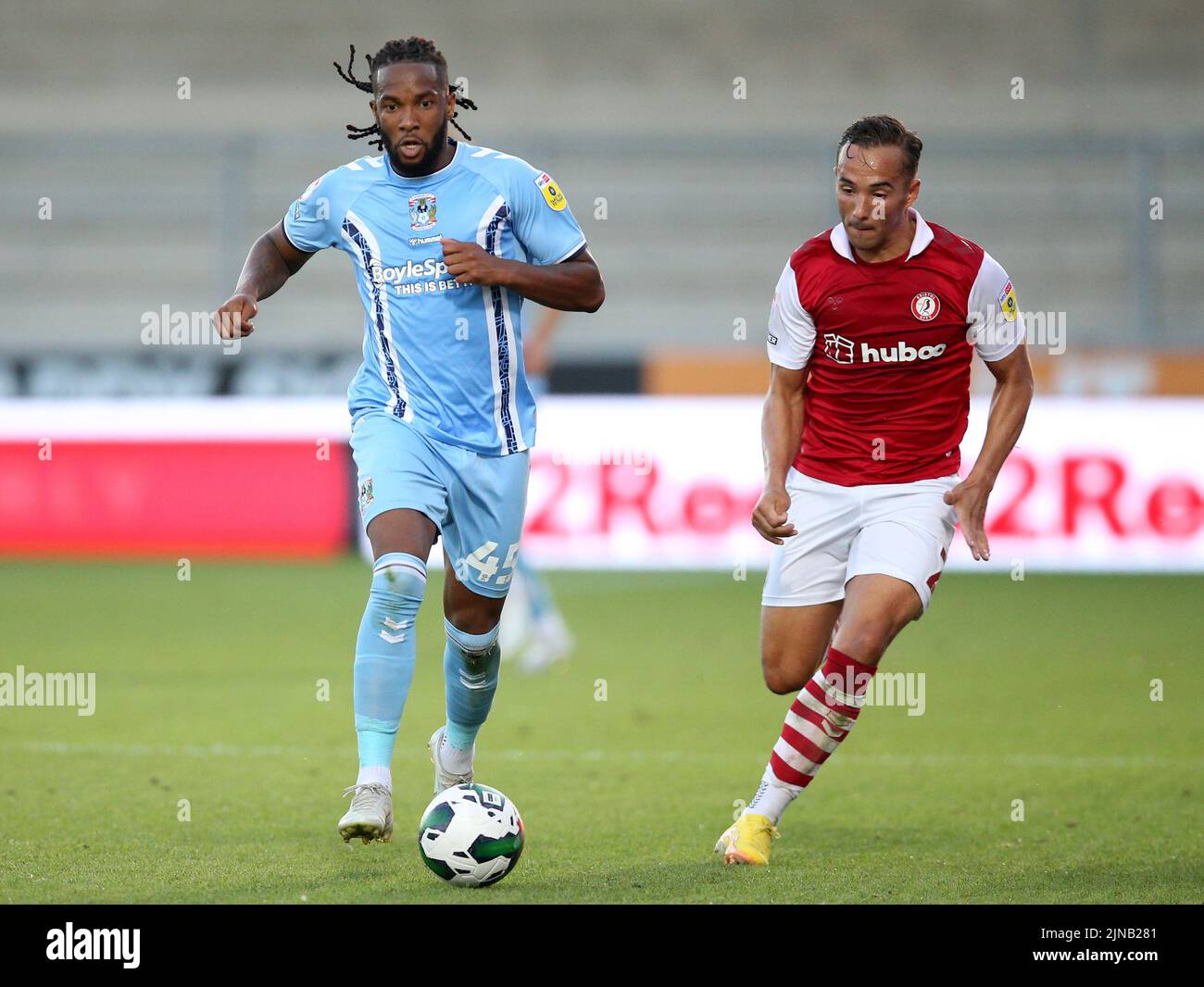 Coventry City's Kasey Palmer (left) and Bristol City's Kane Wilson battle for the ball during the Carabao Cup, first round match at the Pirelli Stadium, Burton upon Trent. Picture date: Wednesday August 10, 2022. Stock Photo