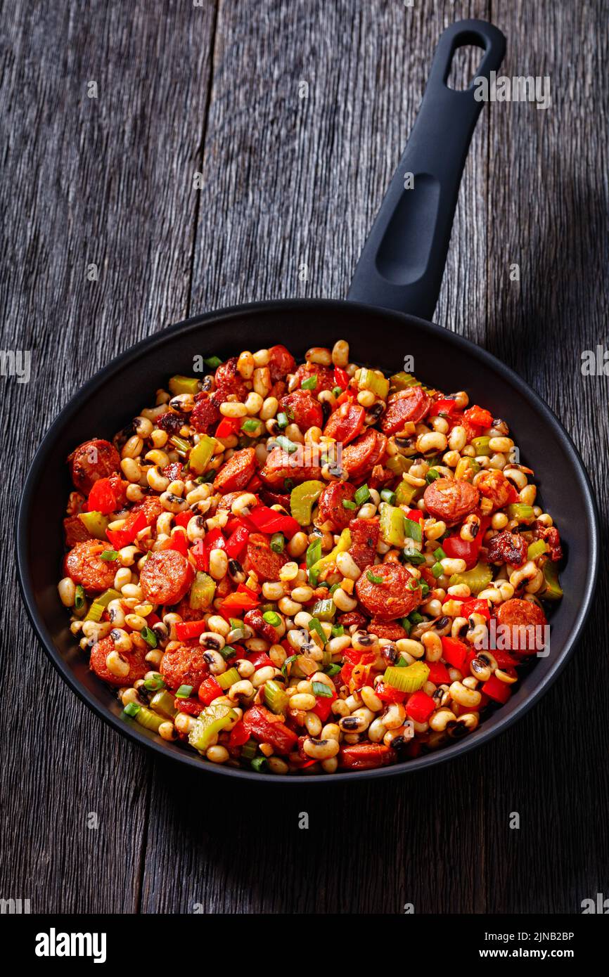 Southern Hoppin John of blackeyed peas, bacon, sausages, vegetables