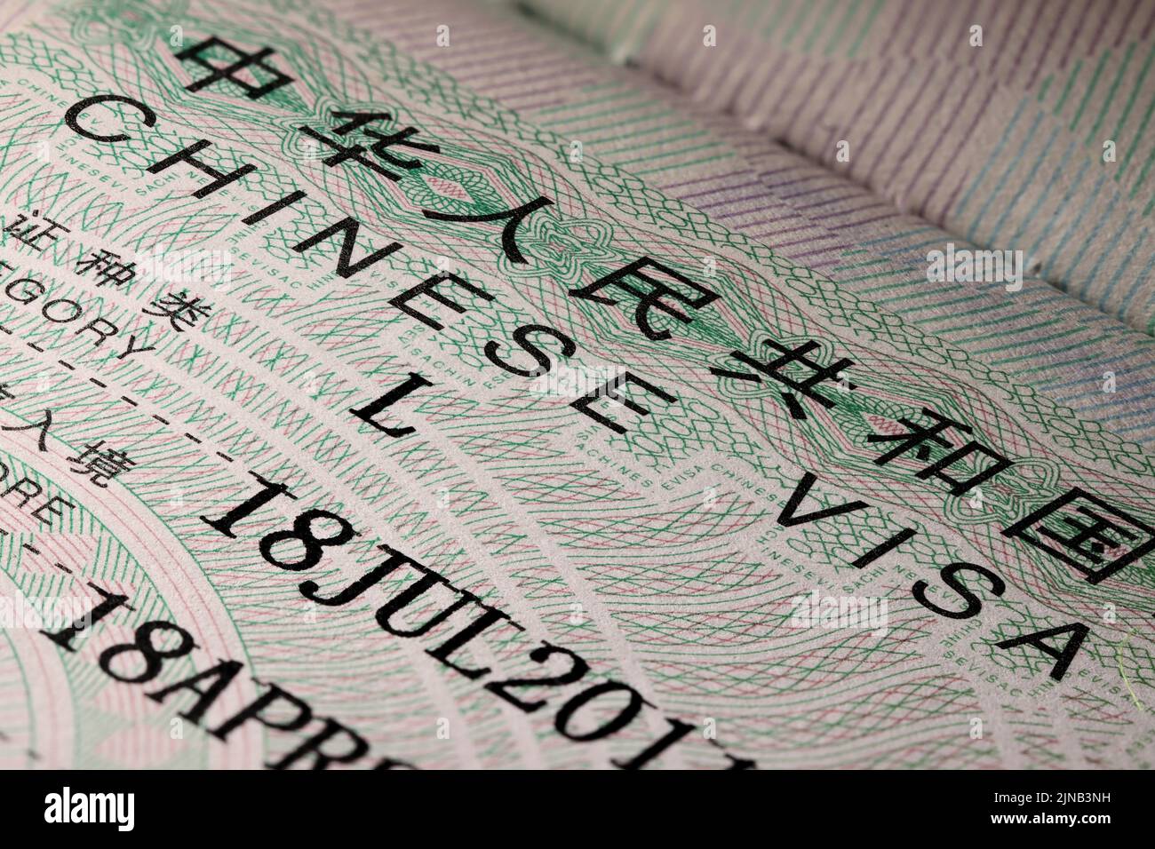 Chinese visa sticker in passport Stock Photo