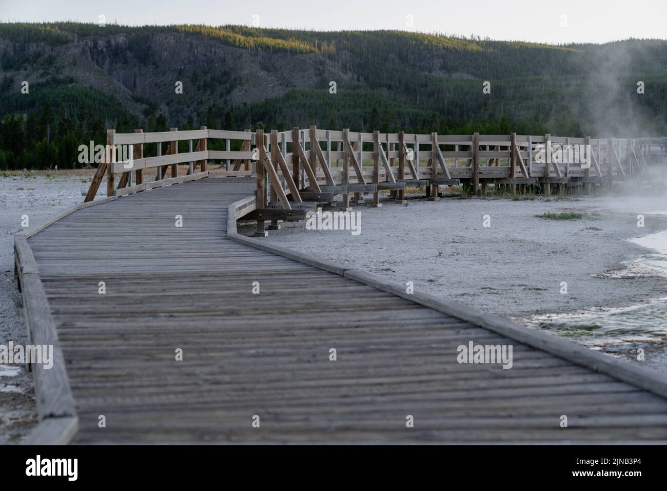 Boardwalks through the Black Sand Basin geyser area of Yellowstone ...