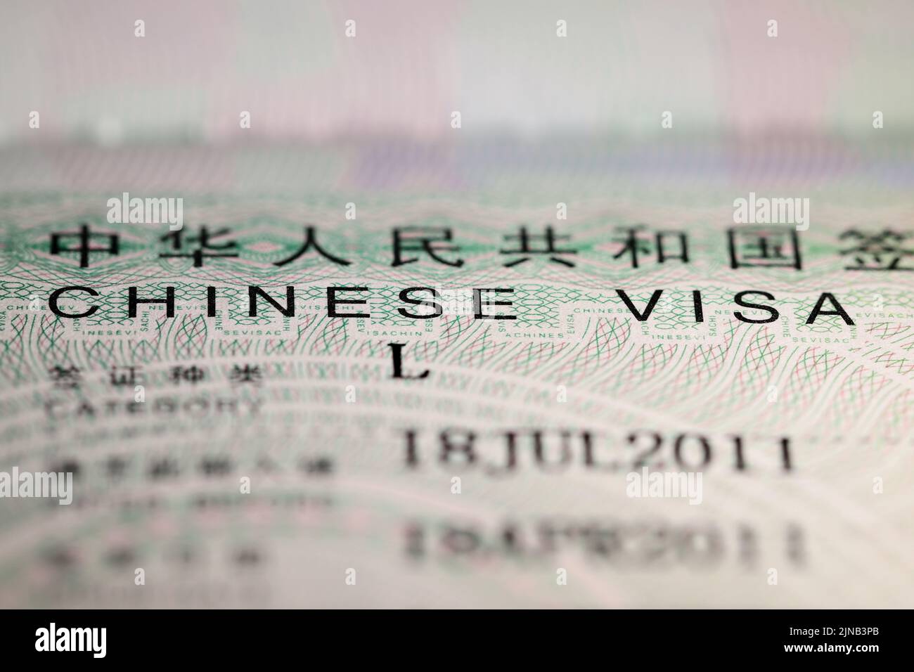 Chinese visa sticker in passport Stock Photo