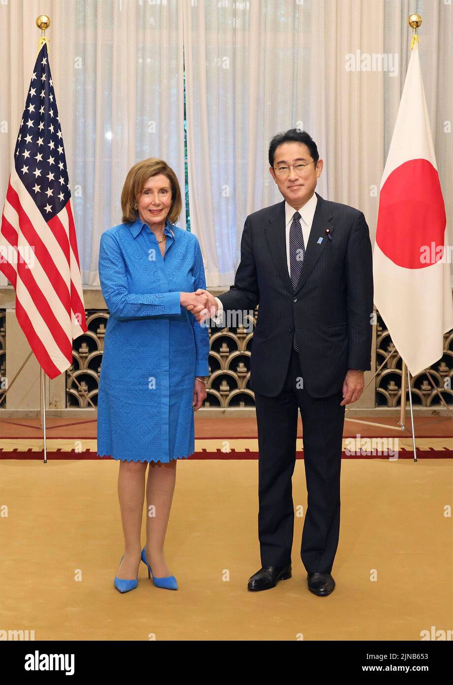 Tokyo, Japan. 05 August, 2022. Japanese Prime Minister Fumio Kishida, right, greets U.S. Speaker of the House Rep. Nancy Pelosi before a breakfast meeting at the Prime Minister Residence of Kantei, August 5, 2022, in Tokyo, Japan.  Credit: Prime Minister Japan/Japanese Prime Minister Office/Alamy Live News Stock Photo