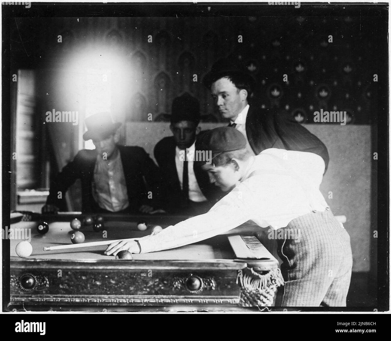 Teaching the young rider how to start. A common scene in Pool Room ...