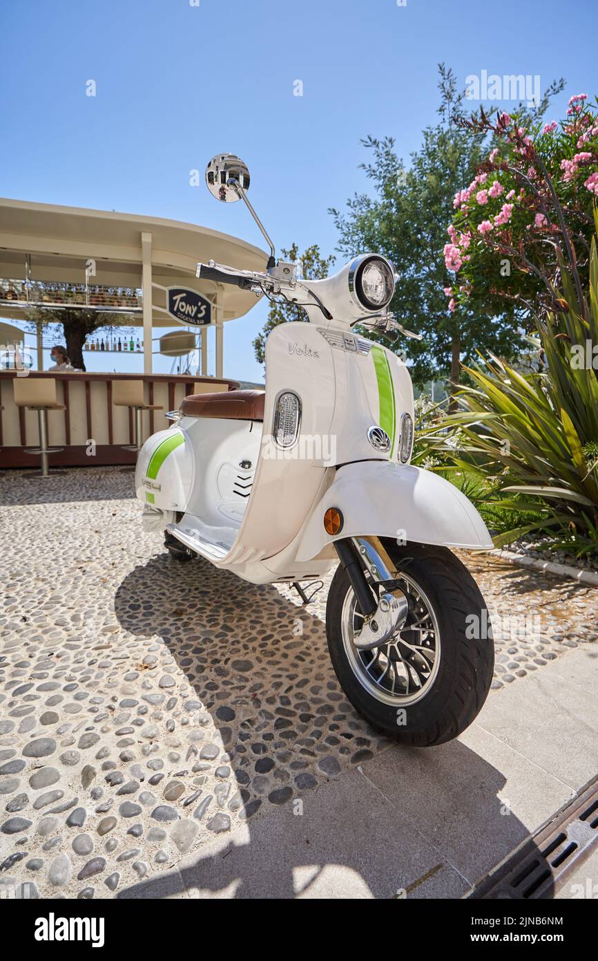 TIVAT, MONTENEGRO - JULY 17, 2021: Stylish retro moped of Volta on the street in a european city Stock Photo
