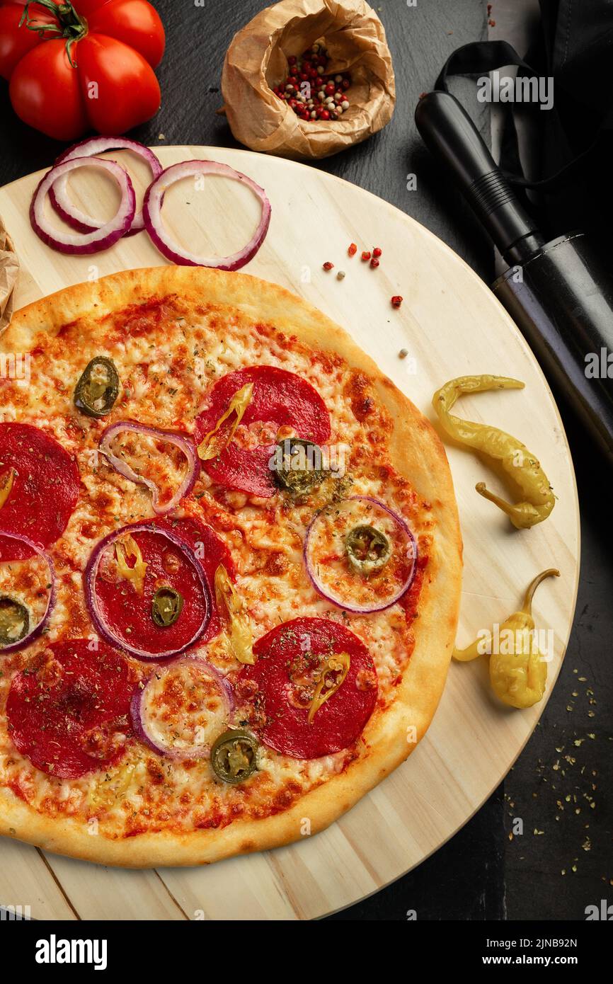 Jalapeno and salami pizza Stock Photo Alamy