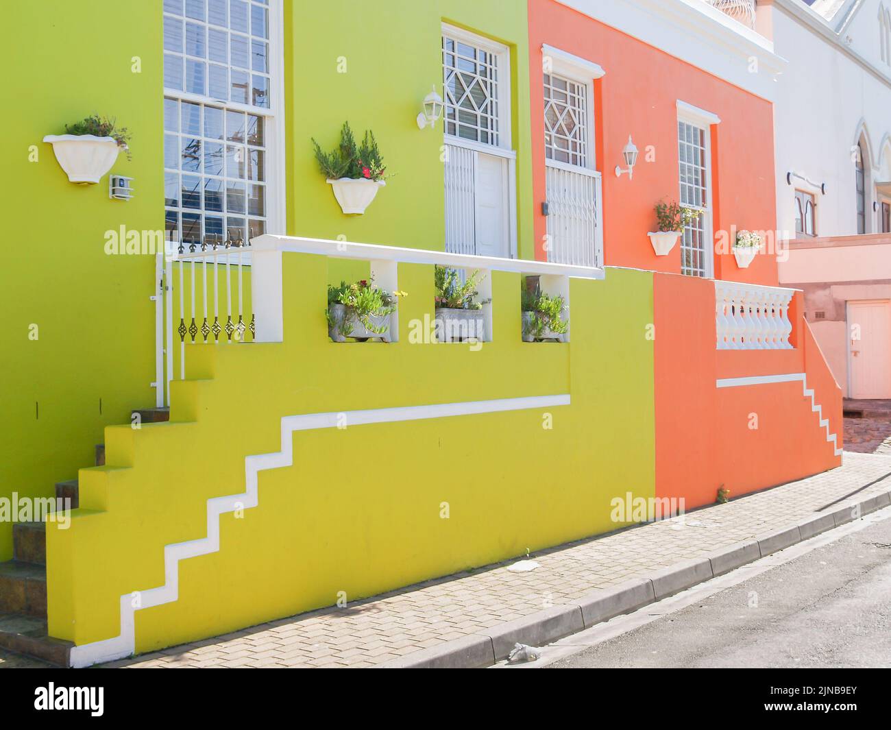 Brightly Coloured distinctive homes of distract of Bo-Kaap in Cape Town Stock Photo