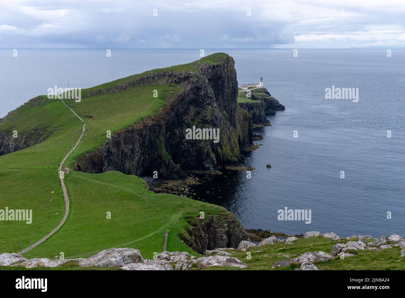 A view of the Neist Point Lighthouse on the green cliffs of the Isle of Skye Stock Photo Alamy