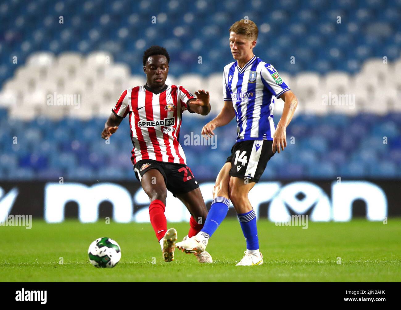 Sunderland's Jay Matete and Sheffield Wednesday's George Byers battle for the ball during the Carabao Cup, first round match at Hillsborough, Sheffield. Picture date: Wednesday August 10, 2022. Stock Photo