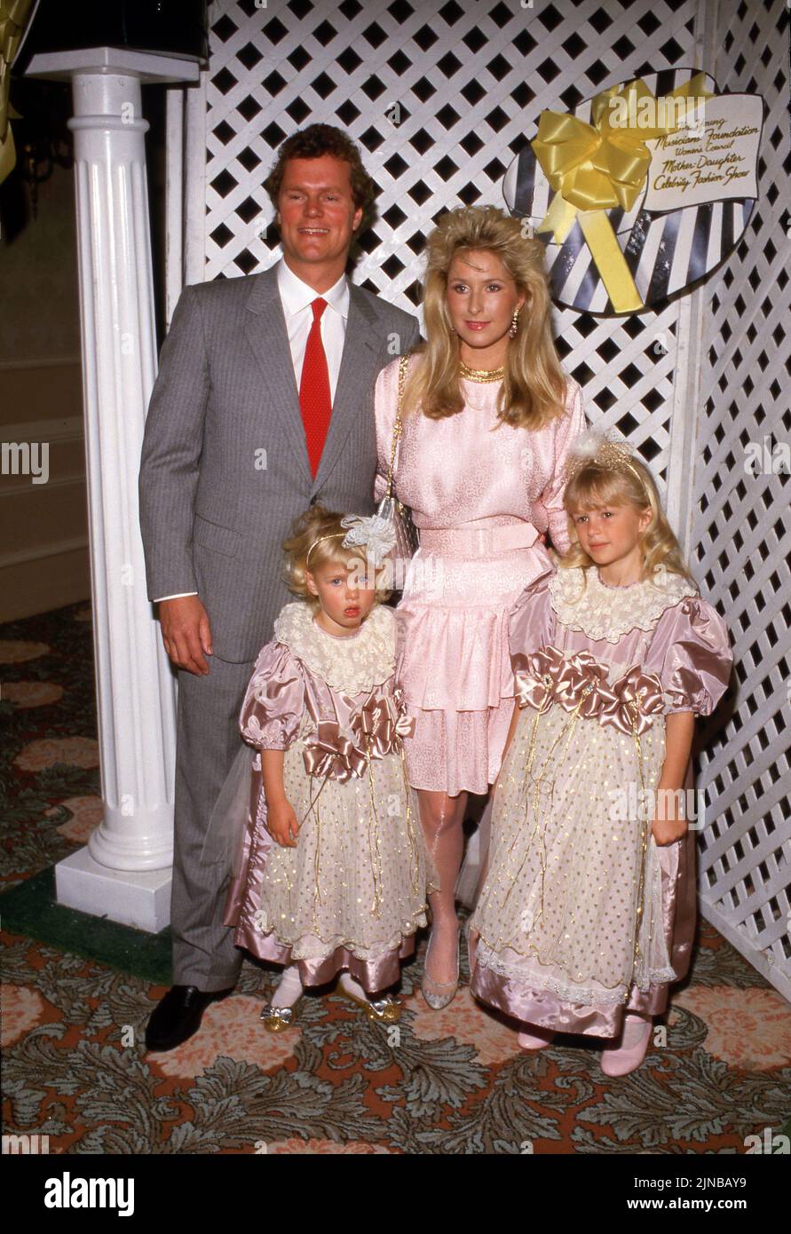 Nicky Hilton and Paris Hilton with parents Ricky Hilton and Kathy