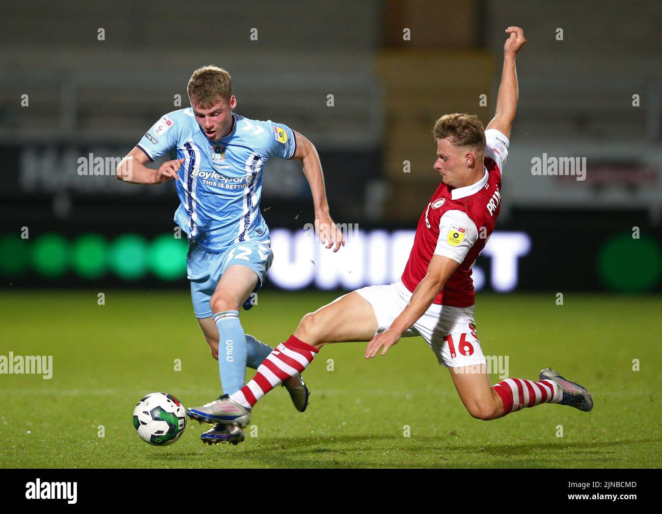 Coventry City's Jack Burroughs (left) and Bristol City's Cameron Pring battle for the ball during the Carabao Cup, first round match at the Pirelli Stadium, Burton upon Trent. Picture date: Wednesday August 10, 2022. Stock Photo