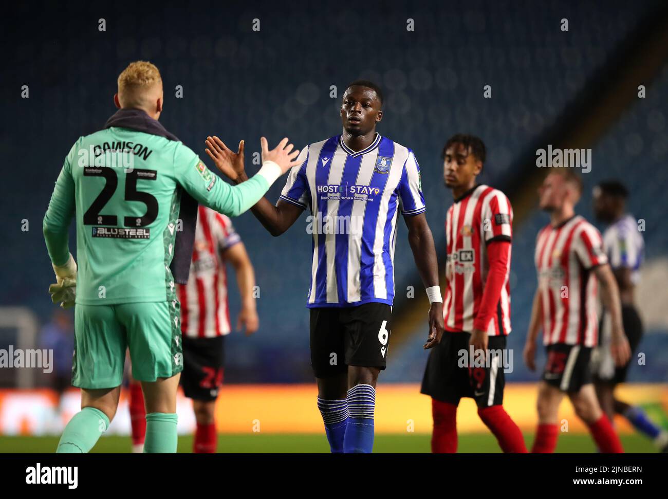 Sheffield Wednesday goalkeeper Cameron Dawson greets team-mate Dominic Iorfa following the Carabao Cup, first round match at Hillsborough, Sheffield. Picture date: Wednesday August 10, 2022. Stock Photo